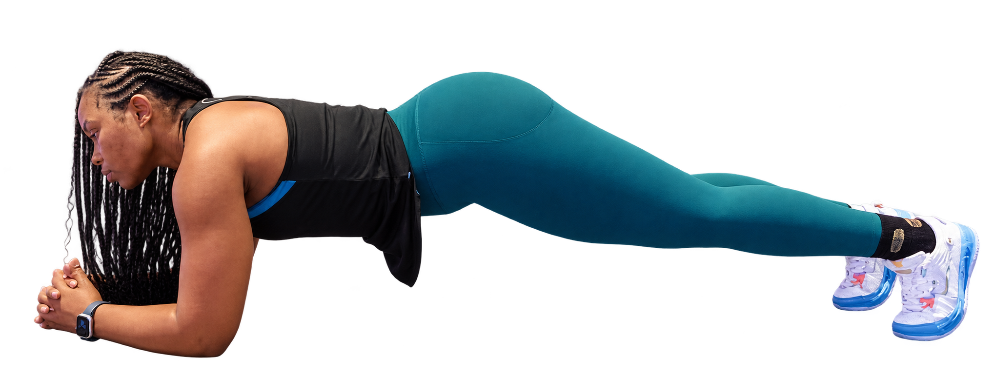Tita demonstrating a forearm plank